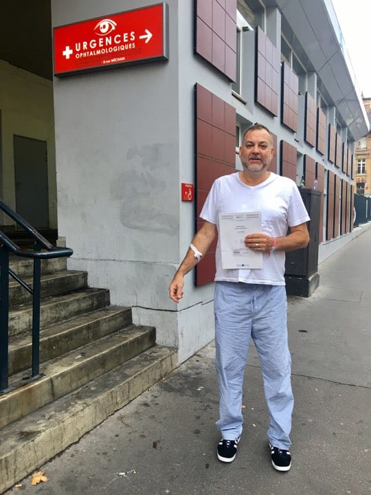 Boyd In Front Of Paris Emergency Room, Paris Travel Advice, Must Know Travel Tips From Couples Travel Bloggers, Best Travel Bloggers, Couples Travel Bloggers